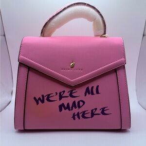 Focus Baby “we’re all mad here” pink vegan leather w crossbody